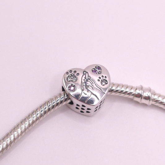 Charm Cuando necesito una mano, encuentro tu pata